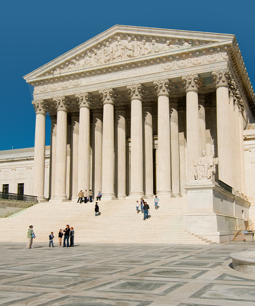 This banner showcases an iconic building with large columns, likely representing a government or judicial building.